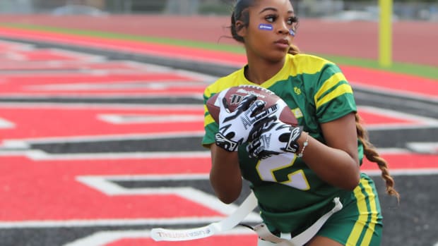 Inland Empire Southern California flag football by John Murphy 4-7-23 flag football A flag football hopeful clutches a pass tightly